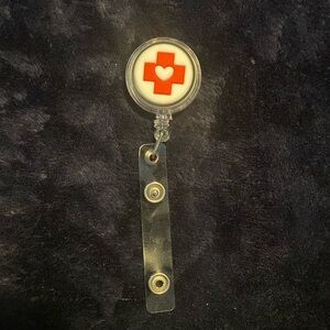 Cute heart in cross badge reel